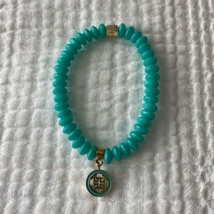 Rustic Cuff turquoise color rubber bracelet with metal hardware, gently used